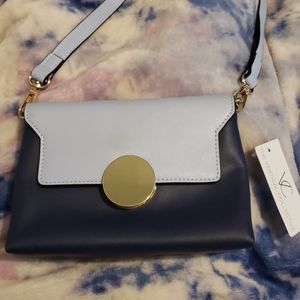 The Vertical Collective brand new two toned purse